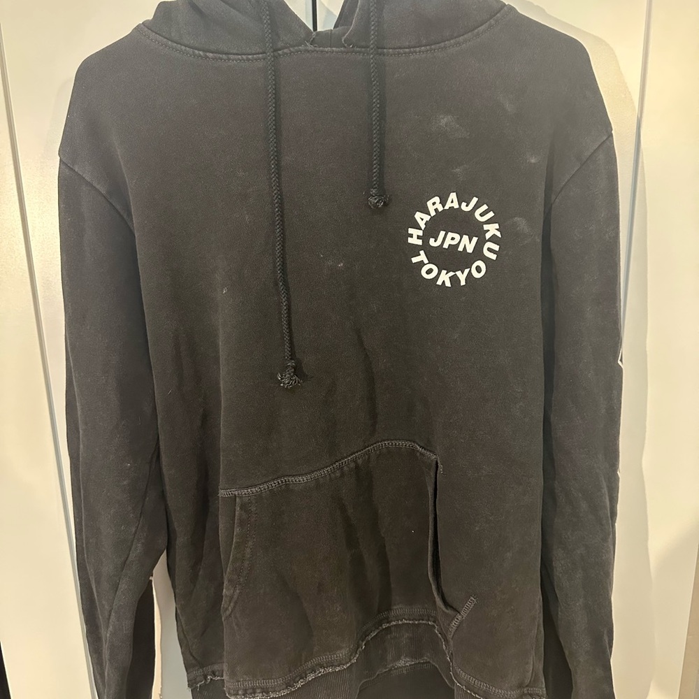 Black Hooded Sweater with Soft Fabric and Circular Logo